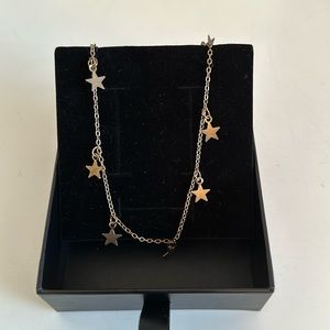 Gold necklace- hanging stars.